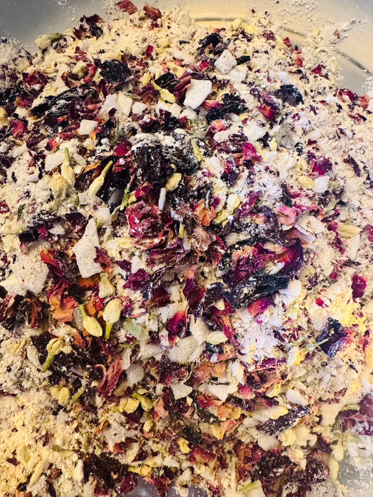 Goddess Aureline™ Bath Tea Bag with a rose quartz, strawberry quartz, and amethyst crystal nestled inside.
