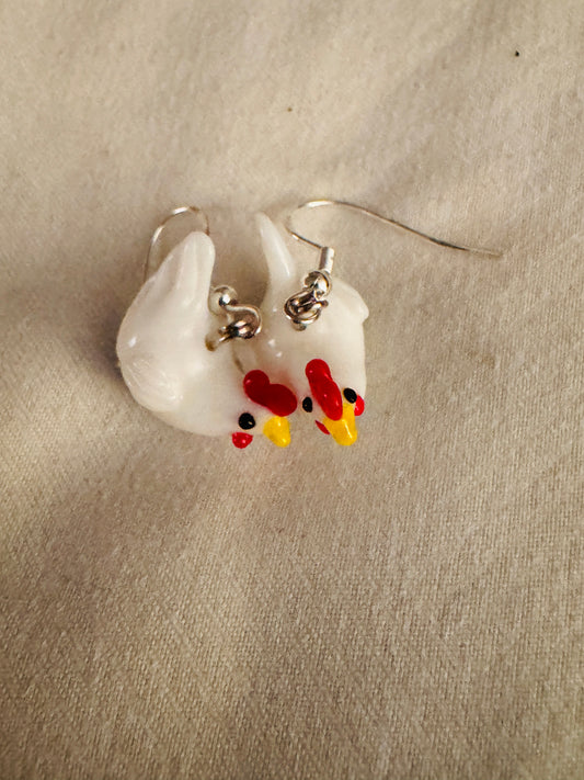 🐔 Chicken Earrings

“Serving farm-chic chaos one cluck at a time. 🐔✨
Lightweight, adorable, and guaranteed to make someone say ‘OMG where did you get those?’”